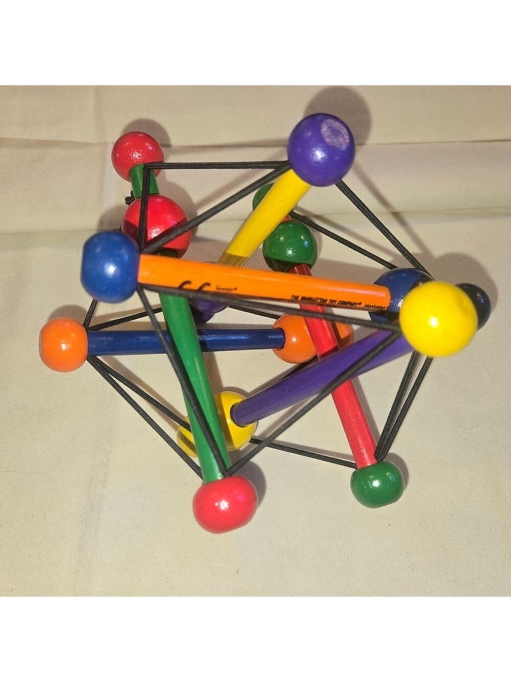 Manhattan Toy Company Skwish Wooden Rattle and Teether seen on Baby Einstein